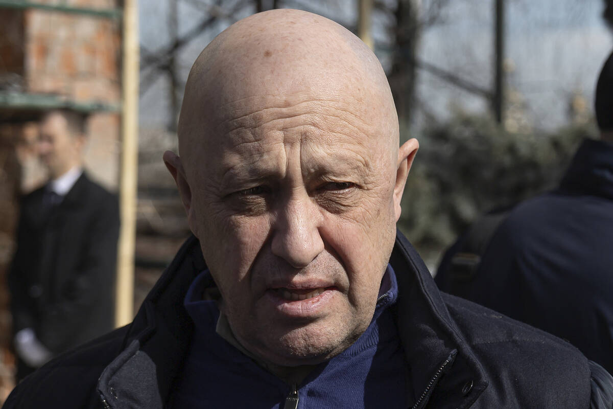 FILE - Yevgeny Prigozhin, the owner of the Wagner Group military company, arrives during a fune ...