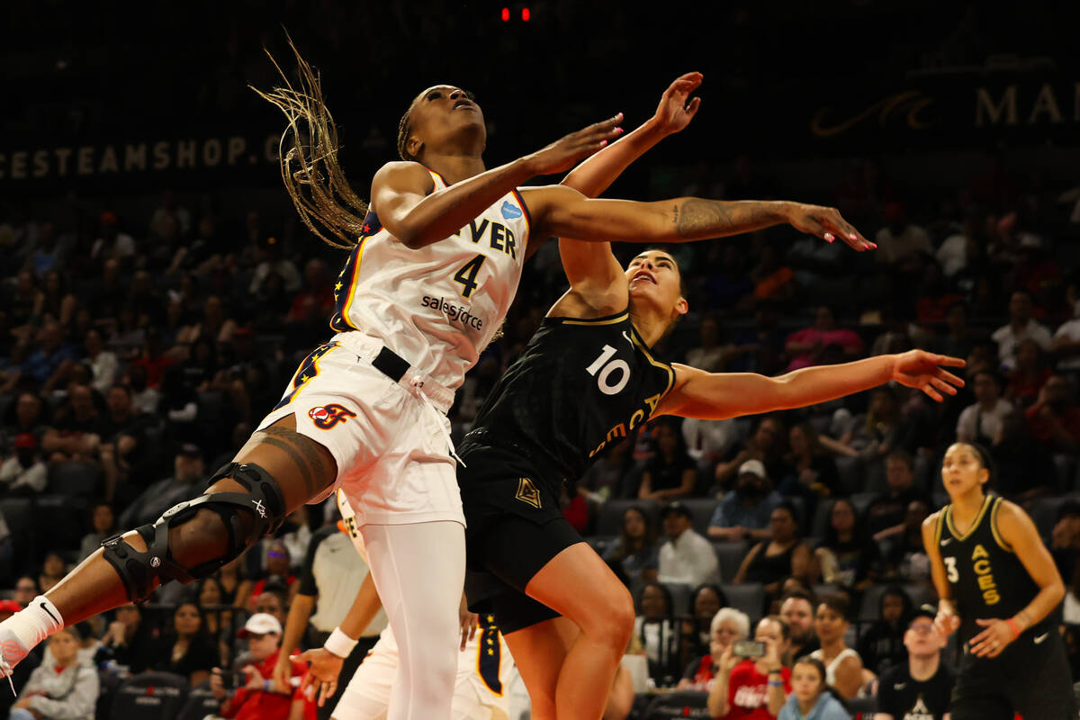 Las Vegas Aces guard Kelsey Plum (10) is fouled as she takes a shot during a game against the I ...