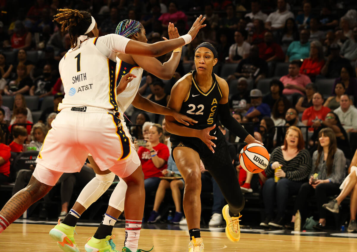 Las Vegas Aces center A'ja Wilson (22) drives the ball down the court during a game against the ...