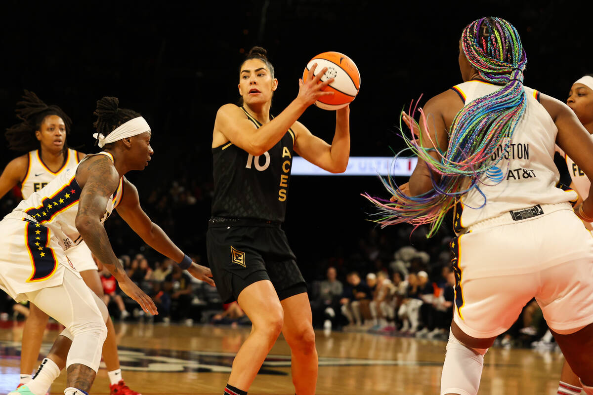 Las Vegas Aces guard Kelsey Plum (10) gets ready to pass the ball during a game against the Ind ...