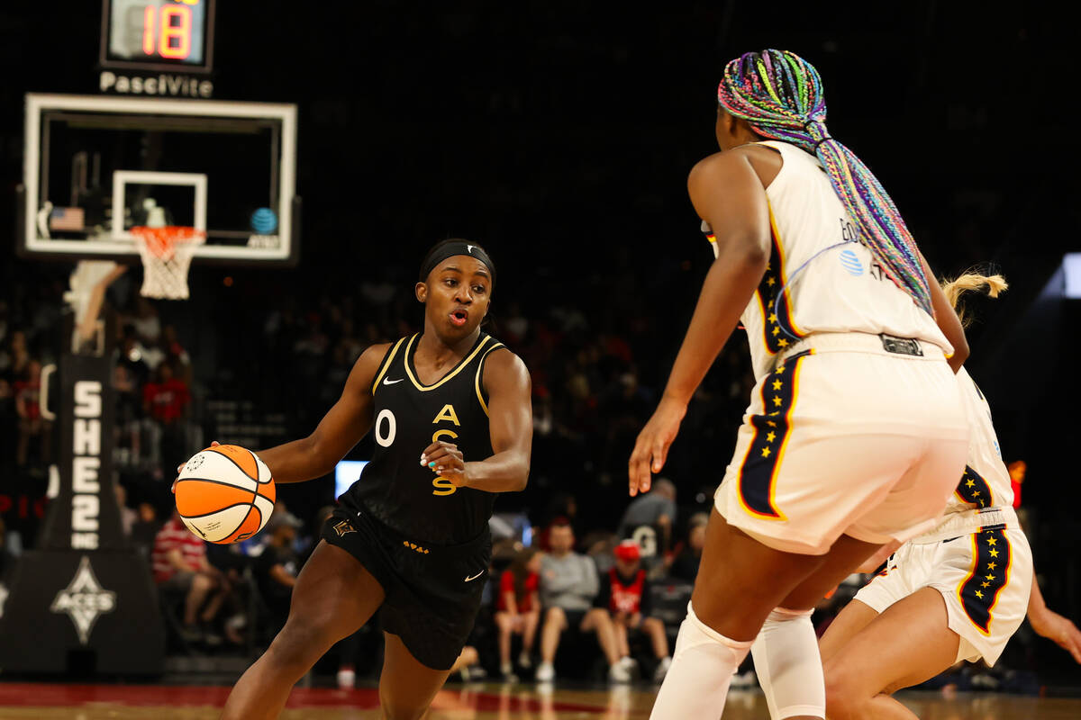 Las Vegas Aces guard Jackie Young (0) dribbles the ball down the court during a game against th ...