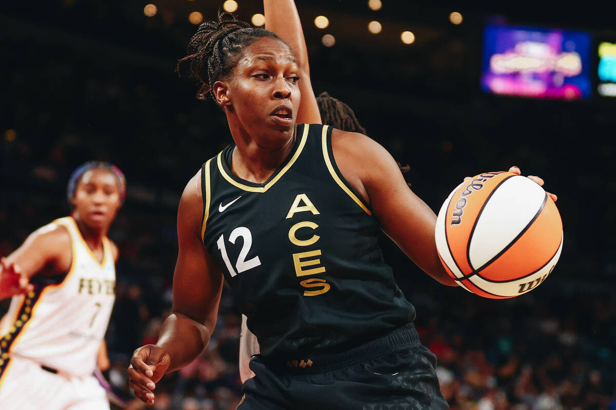 Las Vegas Aces guard Chelsea Gray dribbles the ball during a game against the Indiana Fever on ...