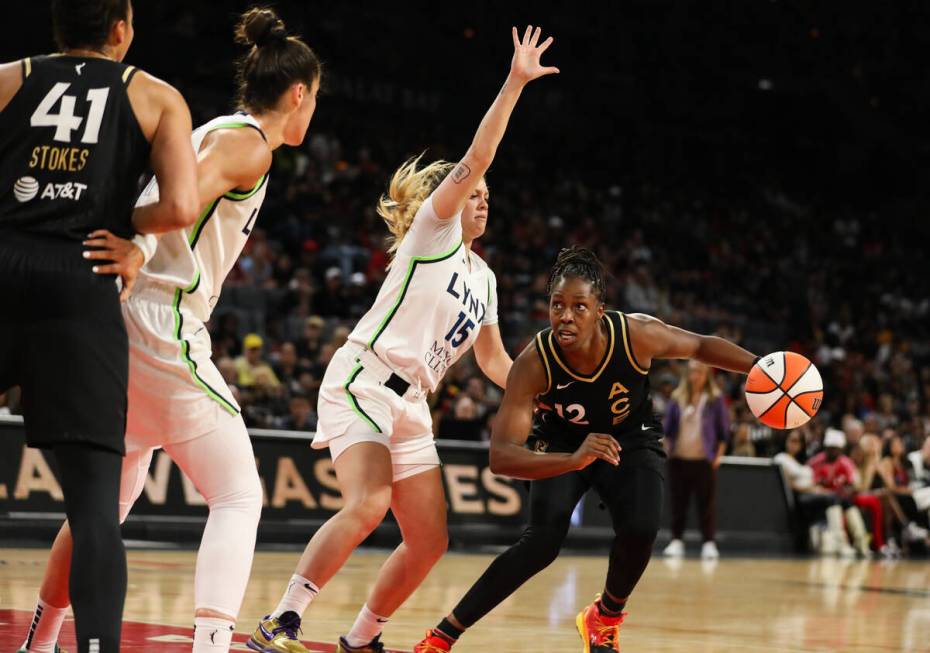 Las Vegas Aces guard Chelsea Gray (12) drives the ball down the court during a game against the ...