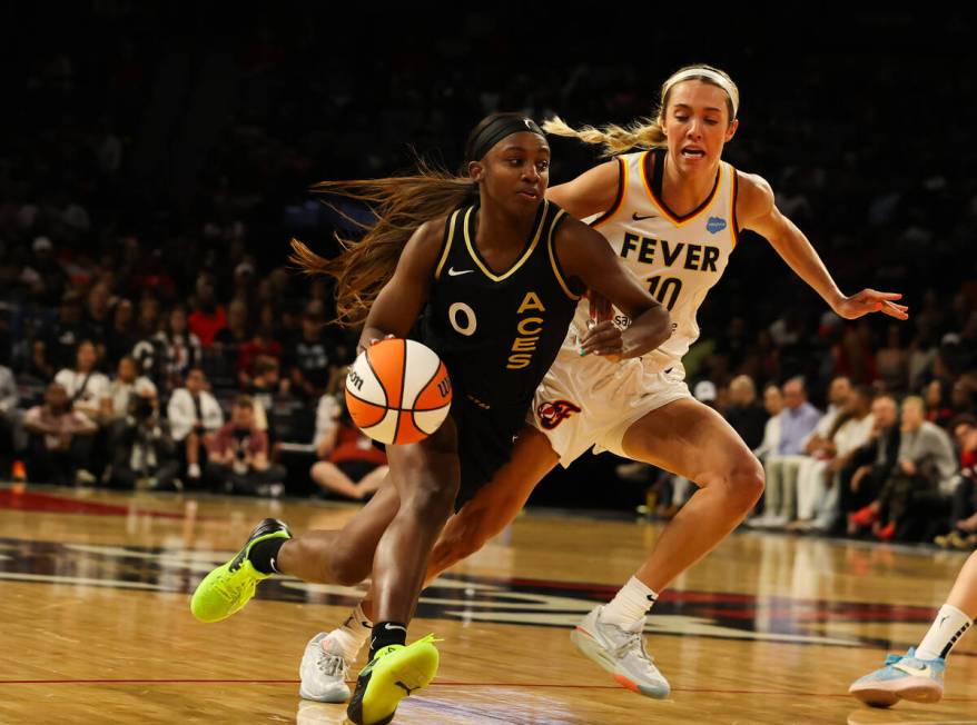 Las Vegas Aces guard Jackie Young (0) dribbles the ball down the court during a game against th ...