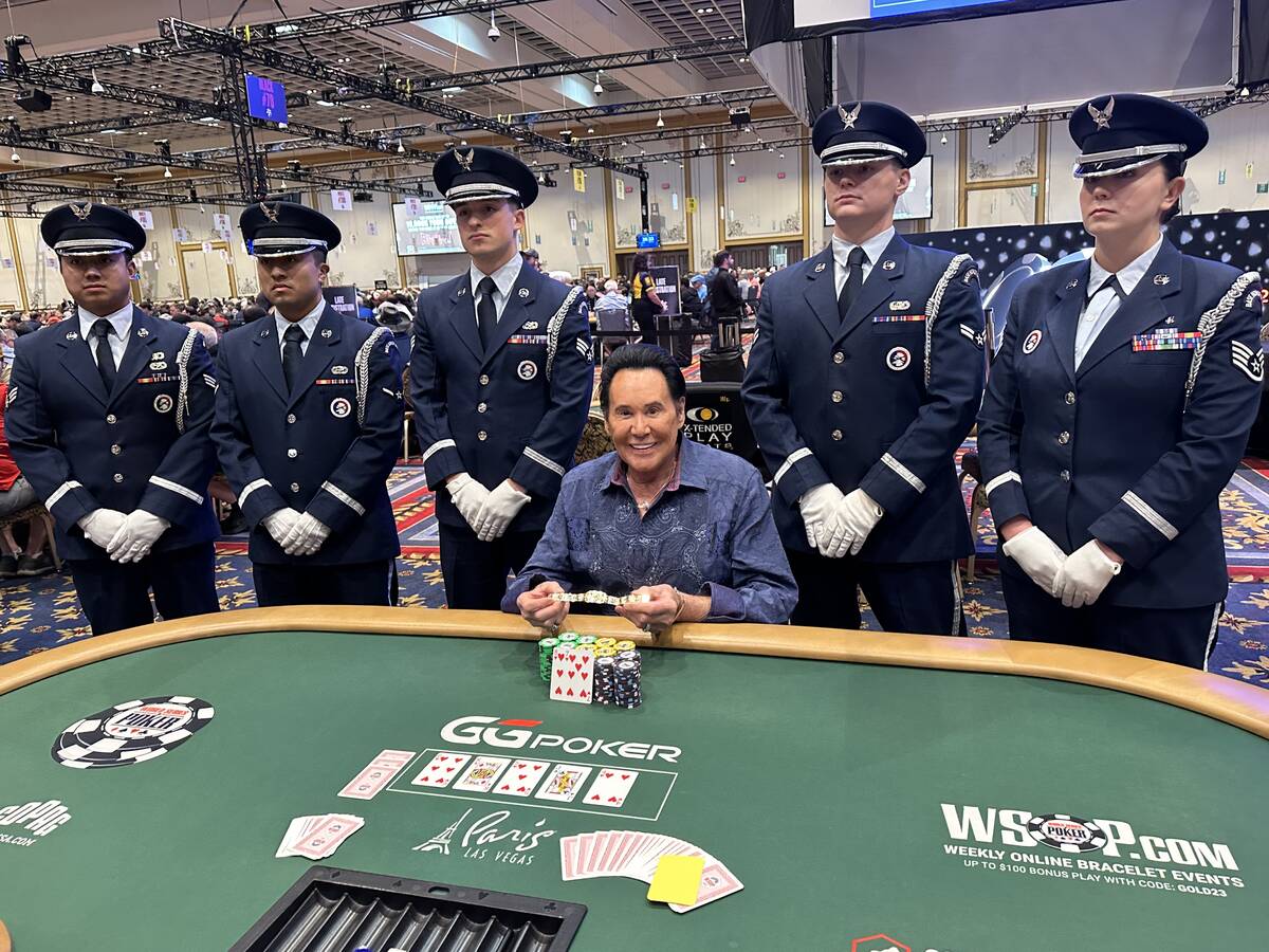 Wayne Newton is shown with members of the Air Force Honor Guard at the World Series of Poker's ...