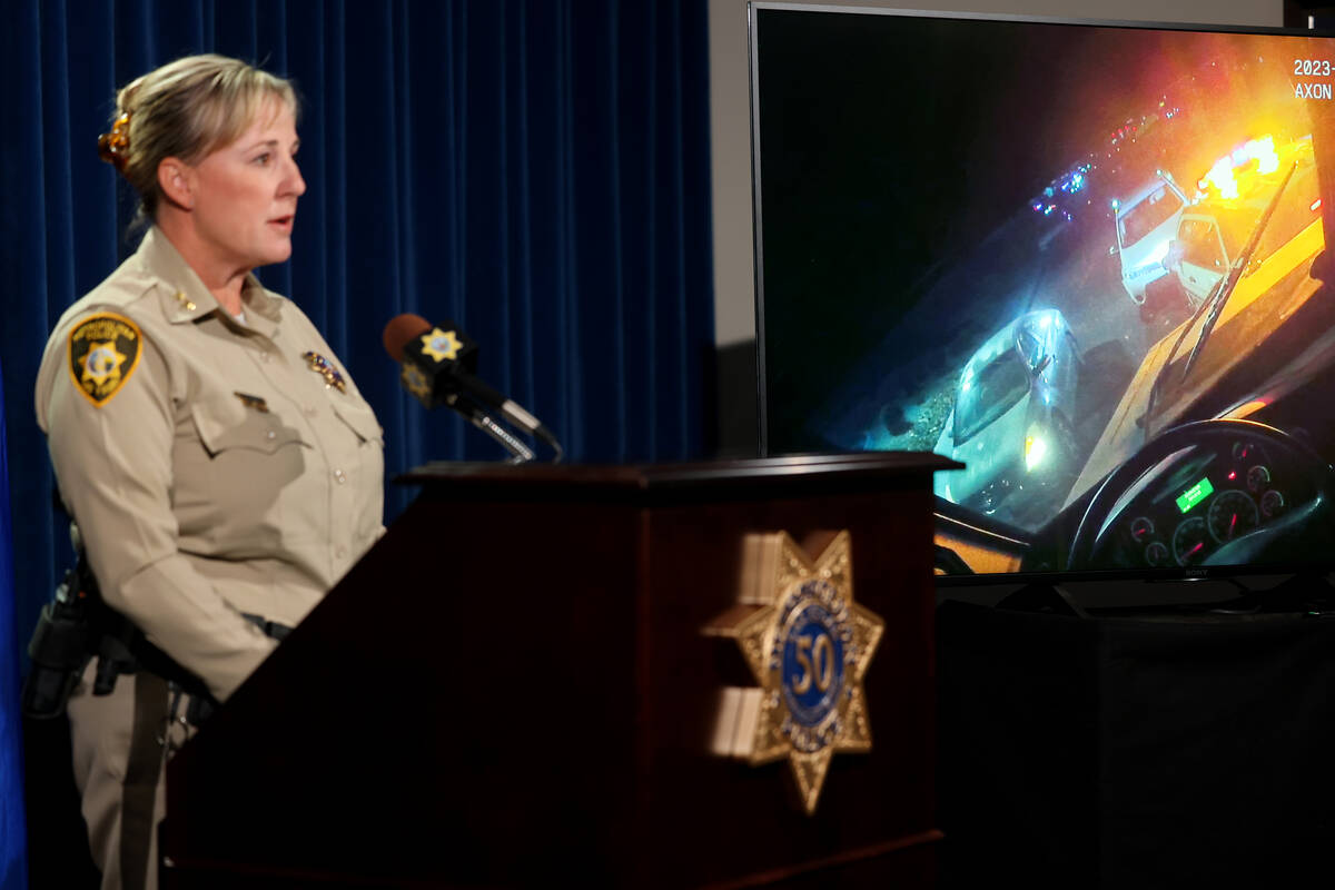 Las Vegas police Assistant Sheriff Jamie Prosser shows body camera video of the apprehension of ...