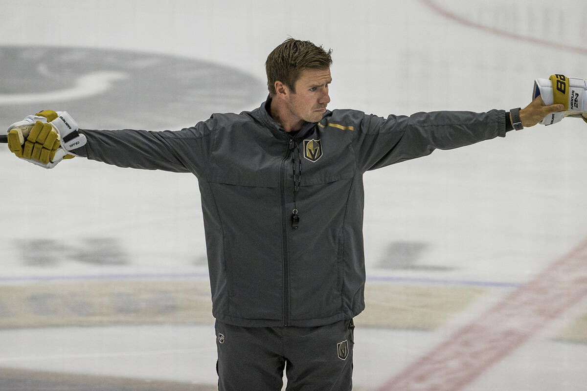 Vegas Golden Knights assistant coach Ryan Craig directs players during practice at City Nationa ...