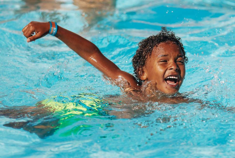 Ki Gleason-Jonea plays in the pool on Friday, June 30, 2023, at the Swim and Social pool at the ...