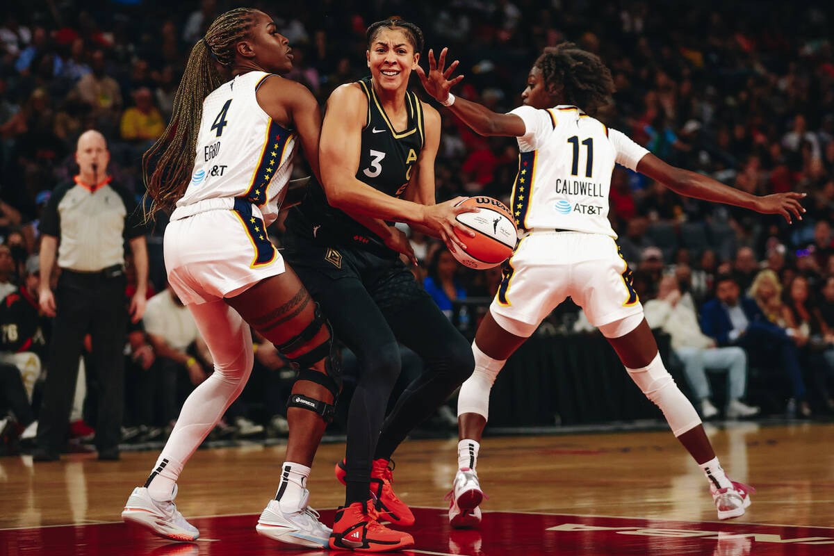 Las Vegas Aces forward/center Candace Parker (3) looks to pass the ball to teammate Kelsey Plum ...