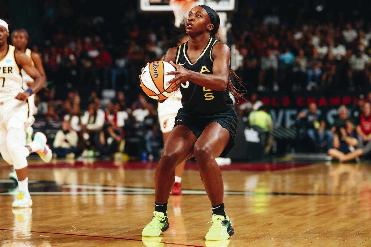 Las Vegas Aces guard Jackie Young attempts a 3-point shot in a game against the Indiana Fever o ...