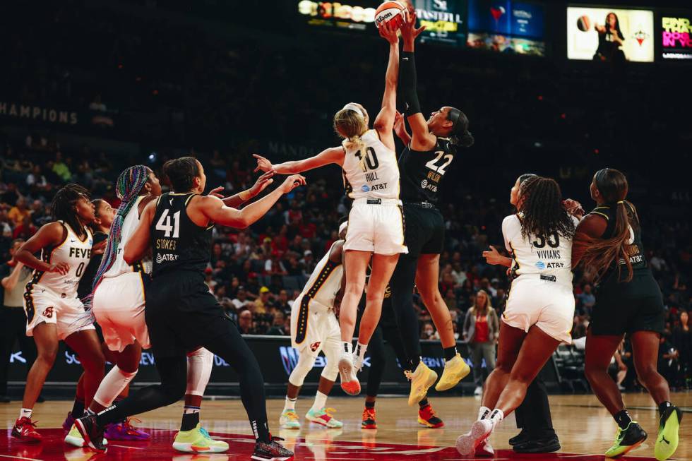 Las Vegas Aces center A’ja Wilson (22) jumps up for possession of the ball against India ...