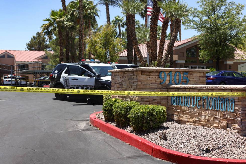 Police at the scene of a homicide at an apartment complex where three people were killed in wes ...