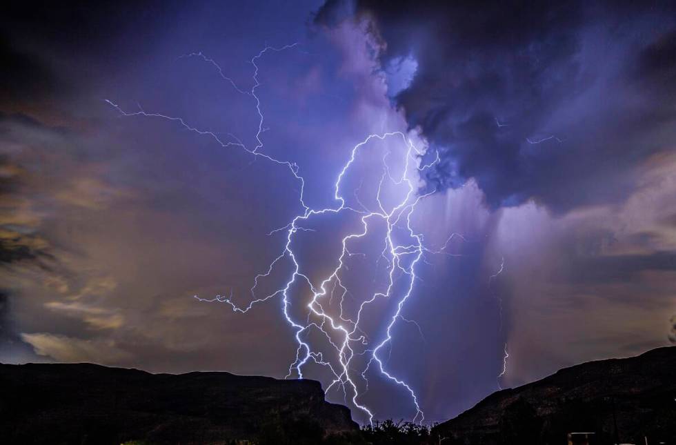 a thunderstorm is seen from Highway 159 over Las Vegas on Thursday, Aug. 11, 2022. (Dakota Snid ...