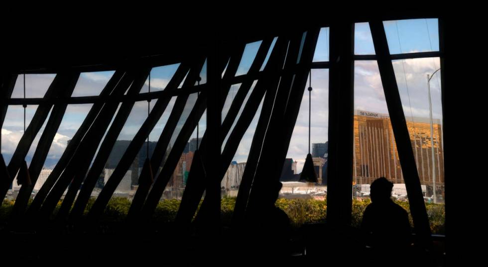 The Las Vegas Strip skyline is reflected in a glass at the Panevino restaurant, Wednesday, Marc ...