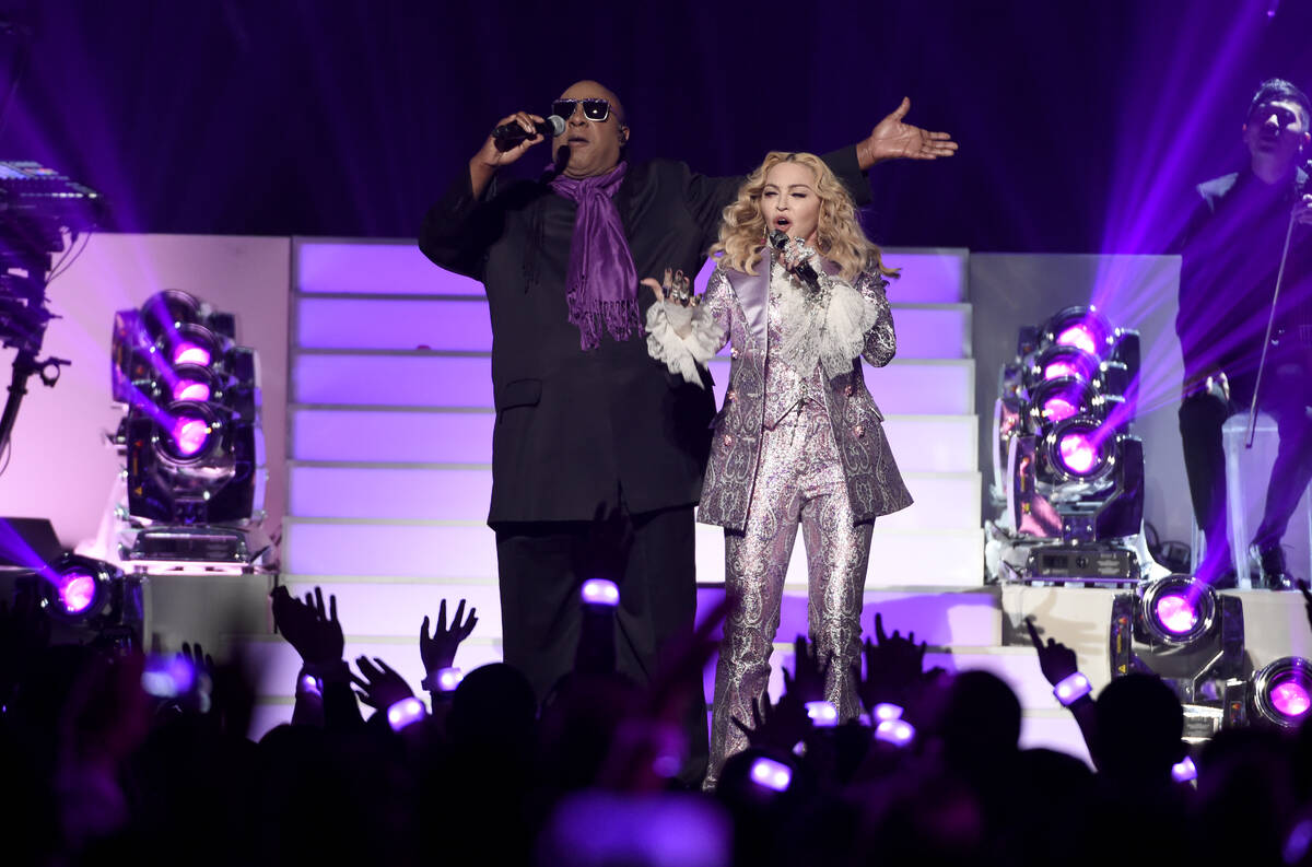 Stevie Wonder, left, and Madonna perform a tribute to Prince at the Billboard Music Awards at t ...