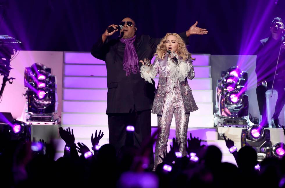 Stevie Wonder, left, and Madonna perform a tribute to Prince at the Billboard Music Awards at t ...