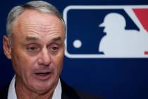 Major League Baseball Commissioner Rob Manfred speaks to members of the media following an owne ...