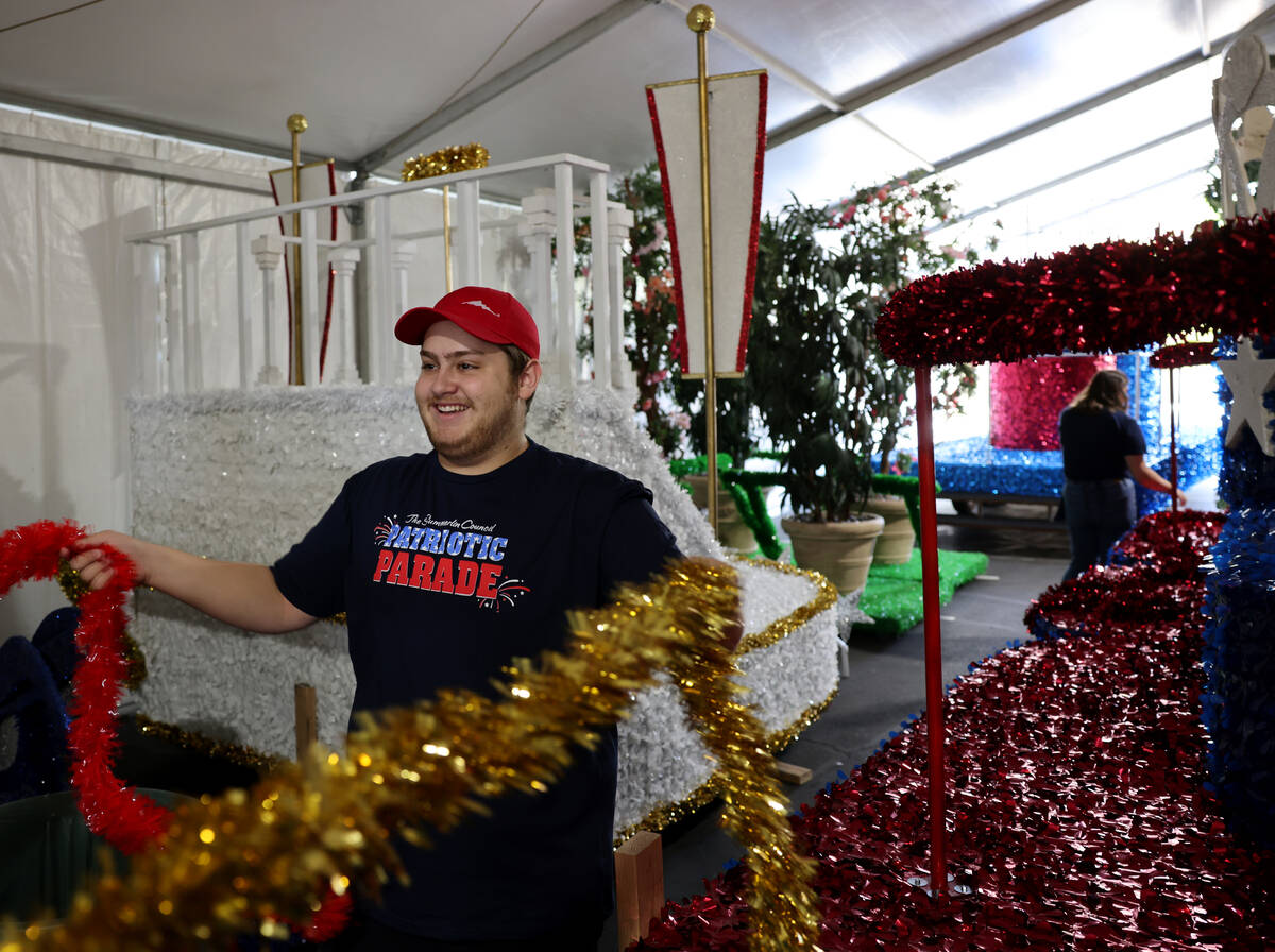 Volunteer Ben Bell works on the Vegas Golden Knights float for the 29th annual Summerlin Counc ...