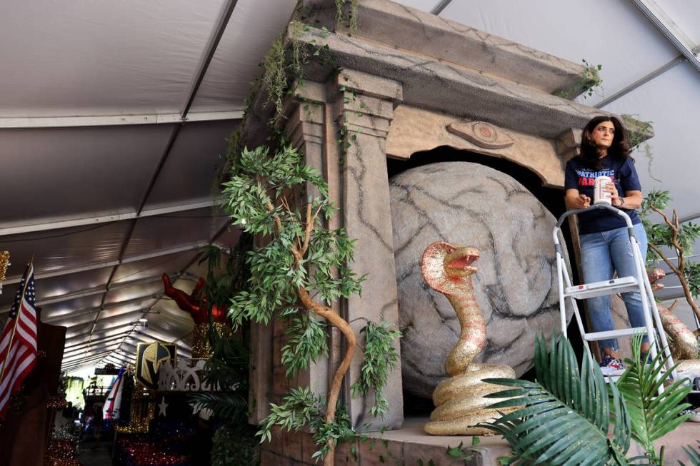 Volunteer Tammie McNeill works on the Indiana Jones float for the 29th annual Summerlin Council ...