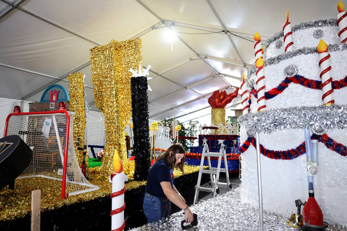 Volunteer Jordyn Doyle works on a float for the 29th annual Summerlin Council Patriotic Parade ...