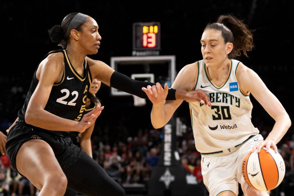 Las Vegas Aces forward A'ja Wilson (22) guards New York Liberty forward Breanna Stewart (30) du ...