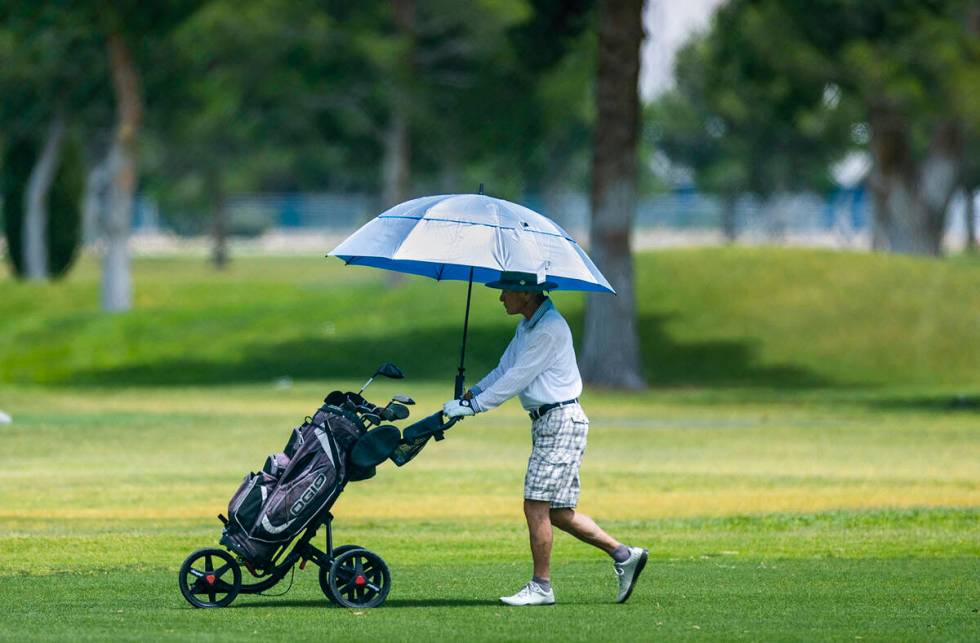 Golfing might not be recommended in the Las Vegas Valley, at least in the heat of the day, with ...