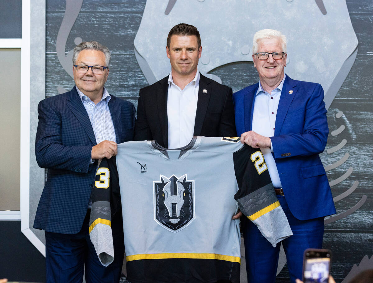 Golden Knights General Manager Kelly McCrimmon, left, and Tim Speltz, right, Silver Knights gen ...