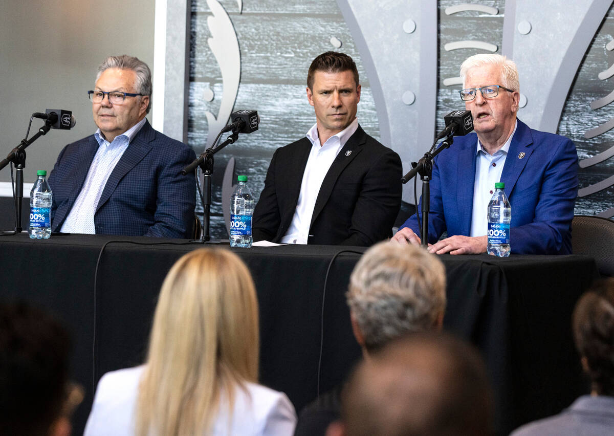 Tim Speltz, right, Silver Knights general manager, speaks as Golden Knights General Manager Kel ...