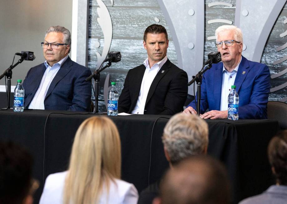 Tim Speltz, right, Silver Knights general manager, speaks as Golden Knights General Manager Kel ...