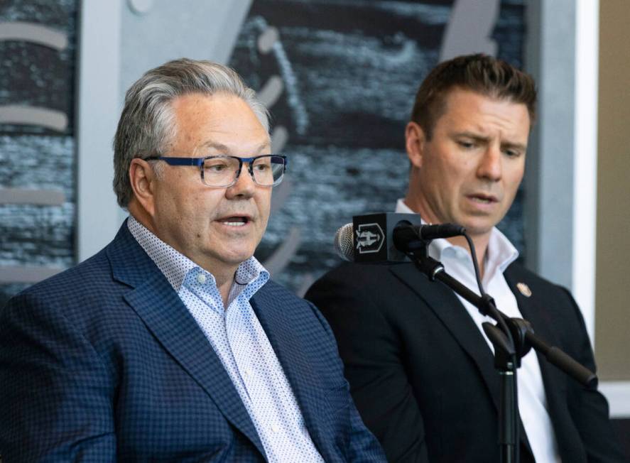 Ryan Craig, right, listens as Golden Knights General Manager Kelly McCrimmon, speaks after the ...