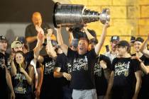 Golden Knights head coach Bruce Cassidy celebrates with the Stanley Cup during Golden Knights S ...