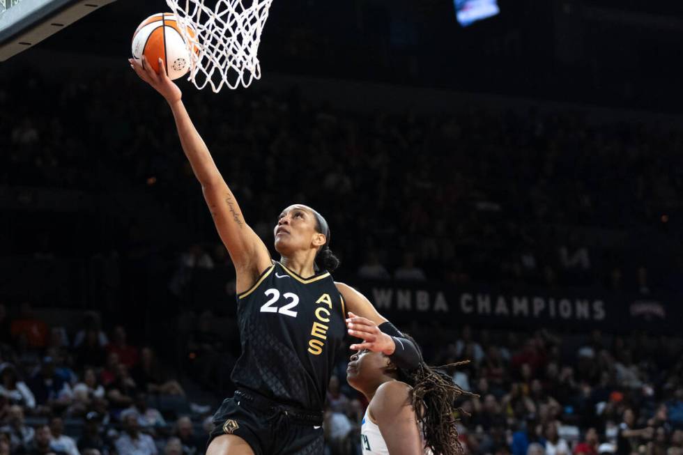 Las Vegas Aces forward A'ja Wilson (22) shoots against New York Liberty forward Jonquel Jones, ...