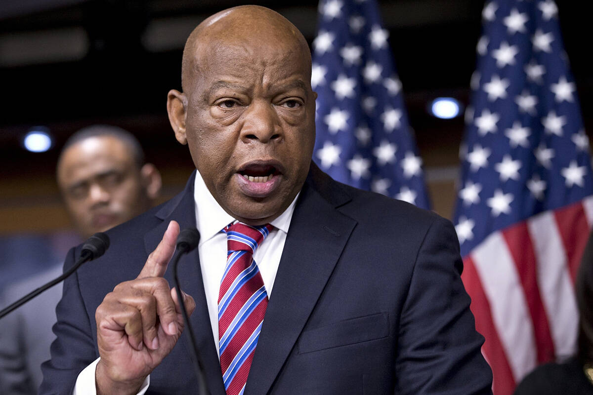 FILE - In this June 25, 2013 file photo, Rep. John Lewis, D-Ga., appears on Capitol Hill in Was ...