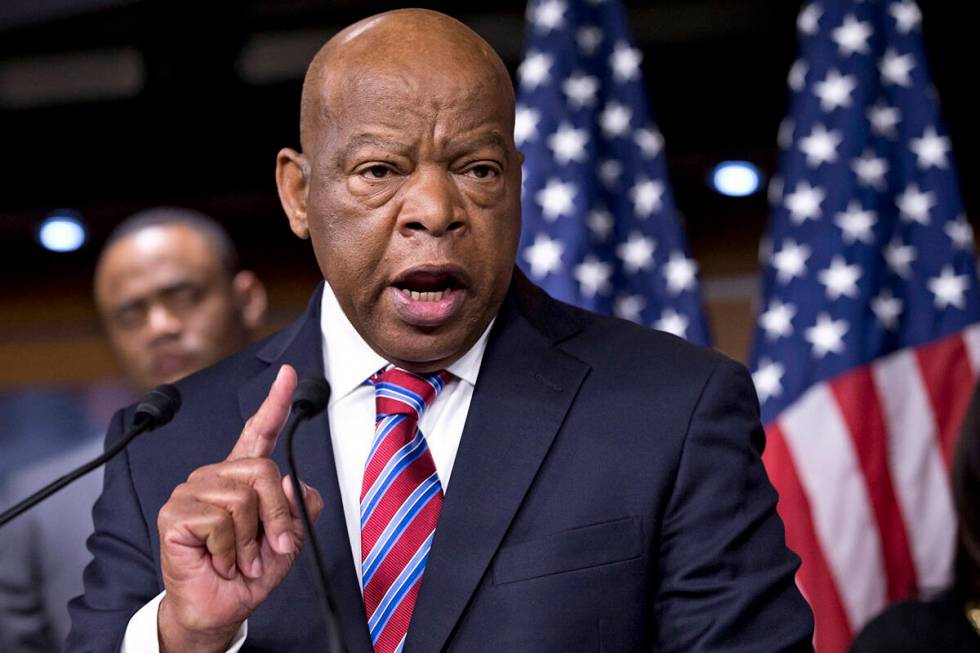 FILE - In this June 25, 2013 file photo, Rep. John Lewis, D-Ga., appears on Capitol Hill in Was ...