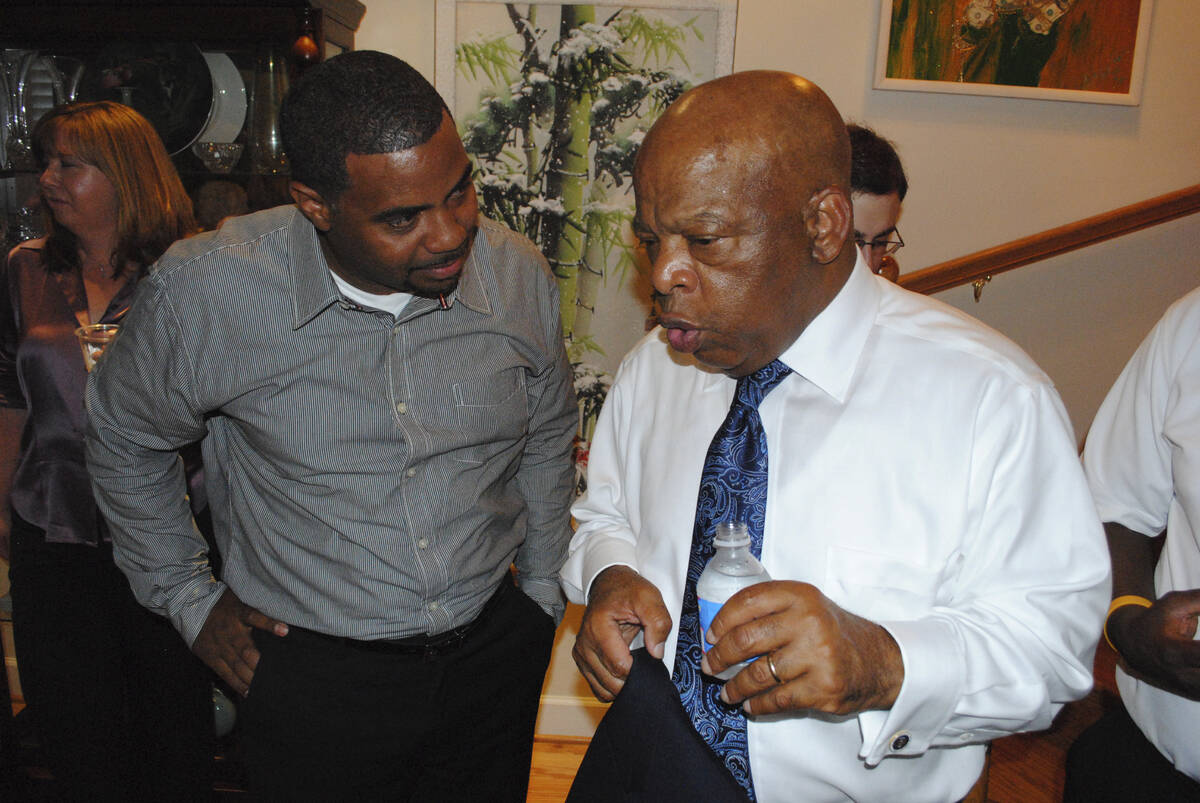 Steven Horsford speaks with Rep. John Lewis, D-Ga., during an event July 21, 2011, at the Washi ...