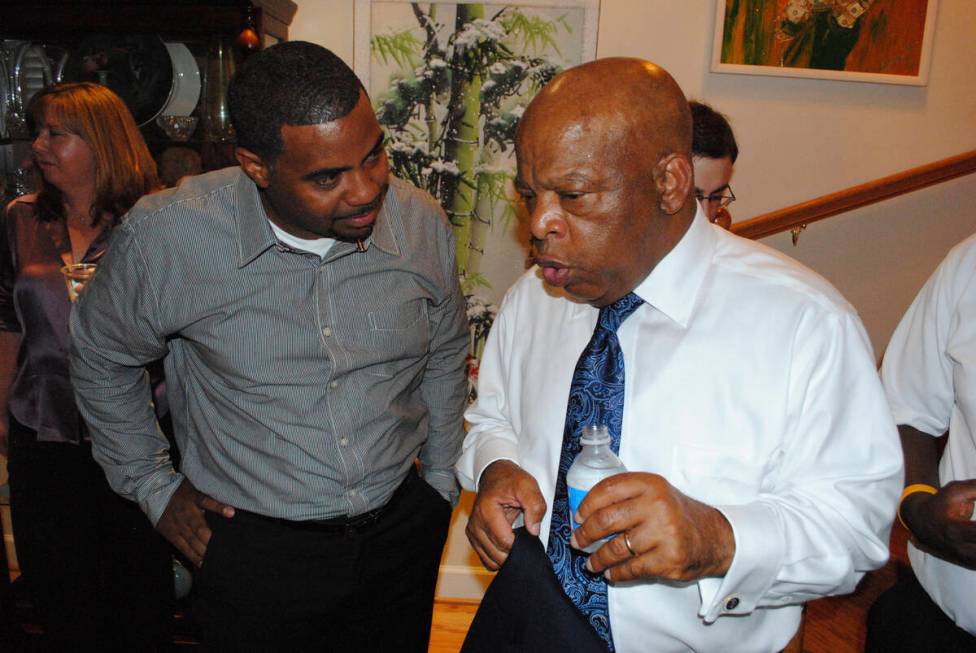 Steven Horsford speaks with Rep. John Lewis, D-Ga., during an event July 21, 2011, at the Washi ...