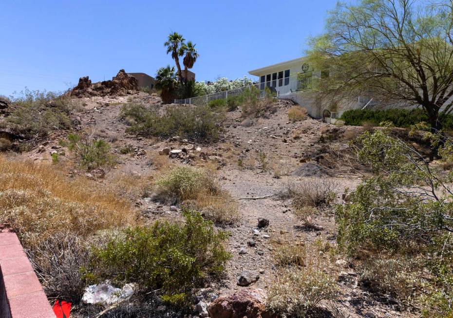 A vacant homesite, center, is seen at the corner of Judi Place and Isabel Drive, on June 2, 202 ...