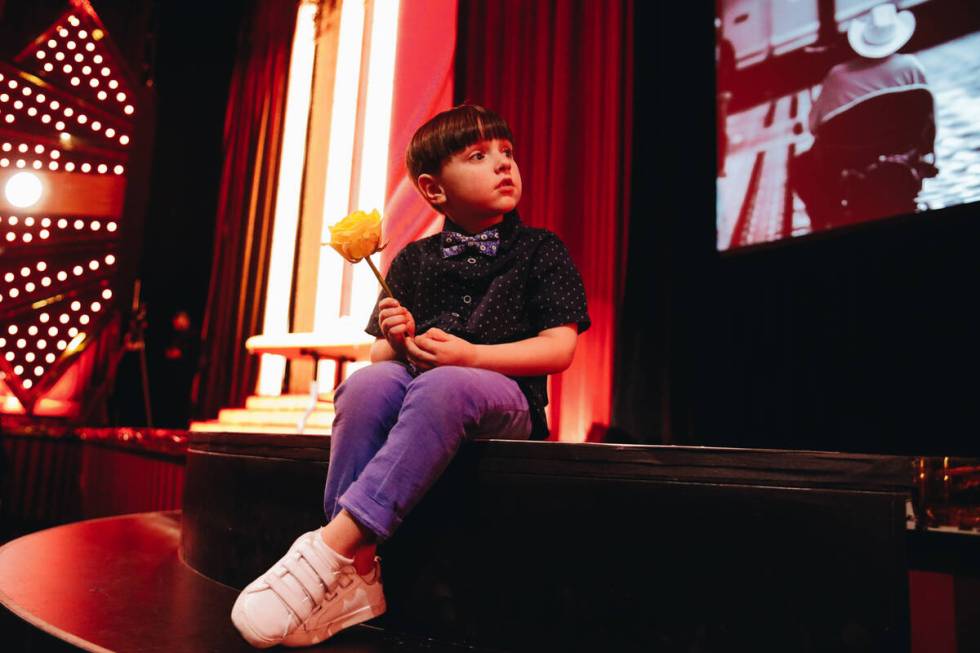 Johnny Brunson, 4, the grandson of poker legend Doyle Brunson, sits on the steps to the Jubilee ...