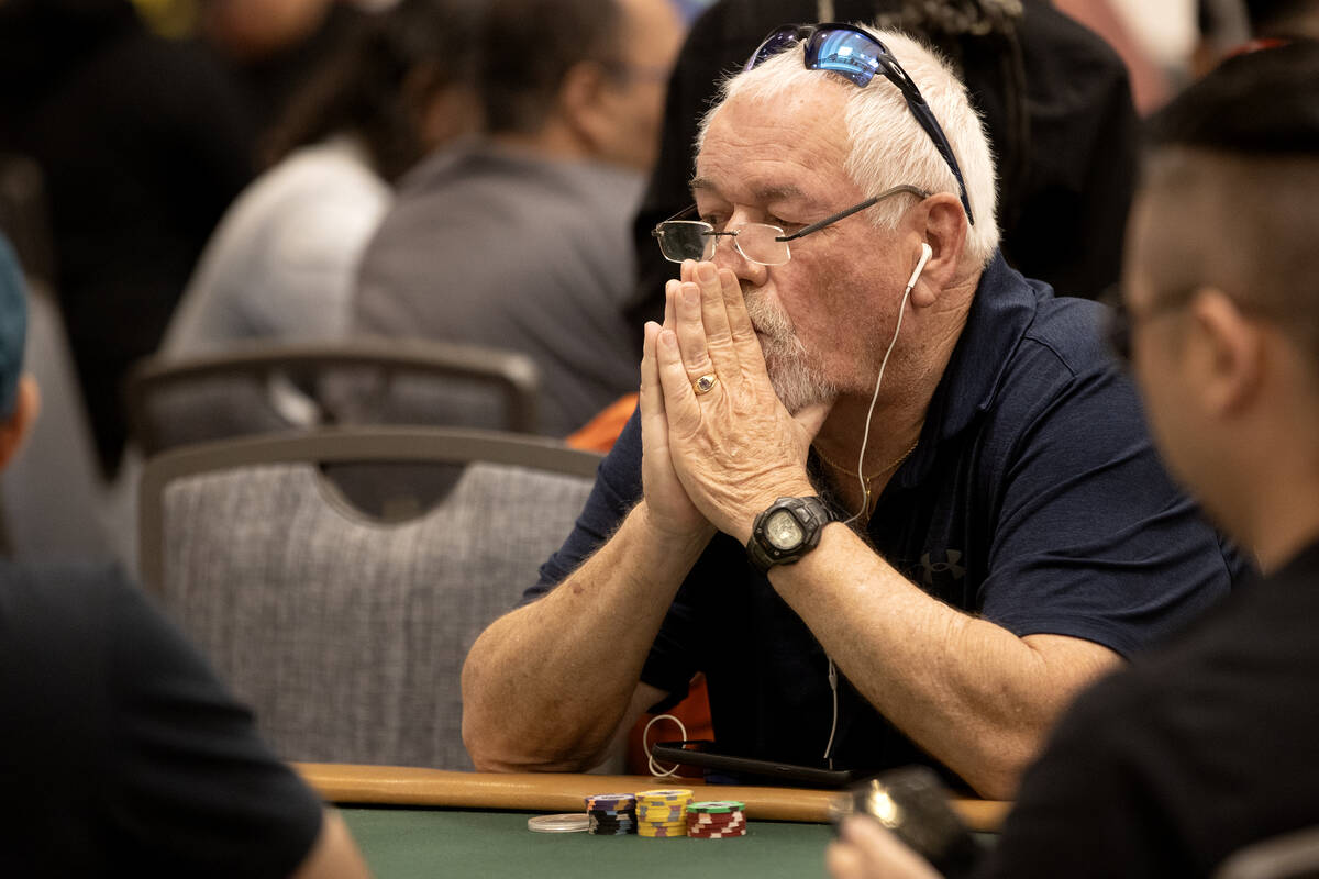 A player concentrates on the game during the World Series of Poker $10,000 buy-in No-limit Hold ...