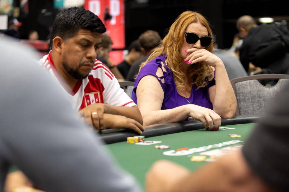 Players concentrate on their game during the World Series of Poker $10,000 buy-in No-limit Hold ...