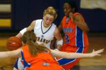 Durango's Lindy La Rocque, left, dribbles past Bishop Gorman's Dee Gaynor, right, during their ...