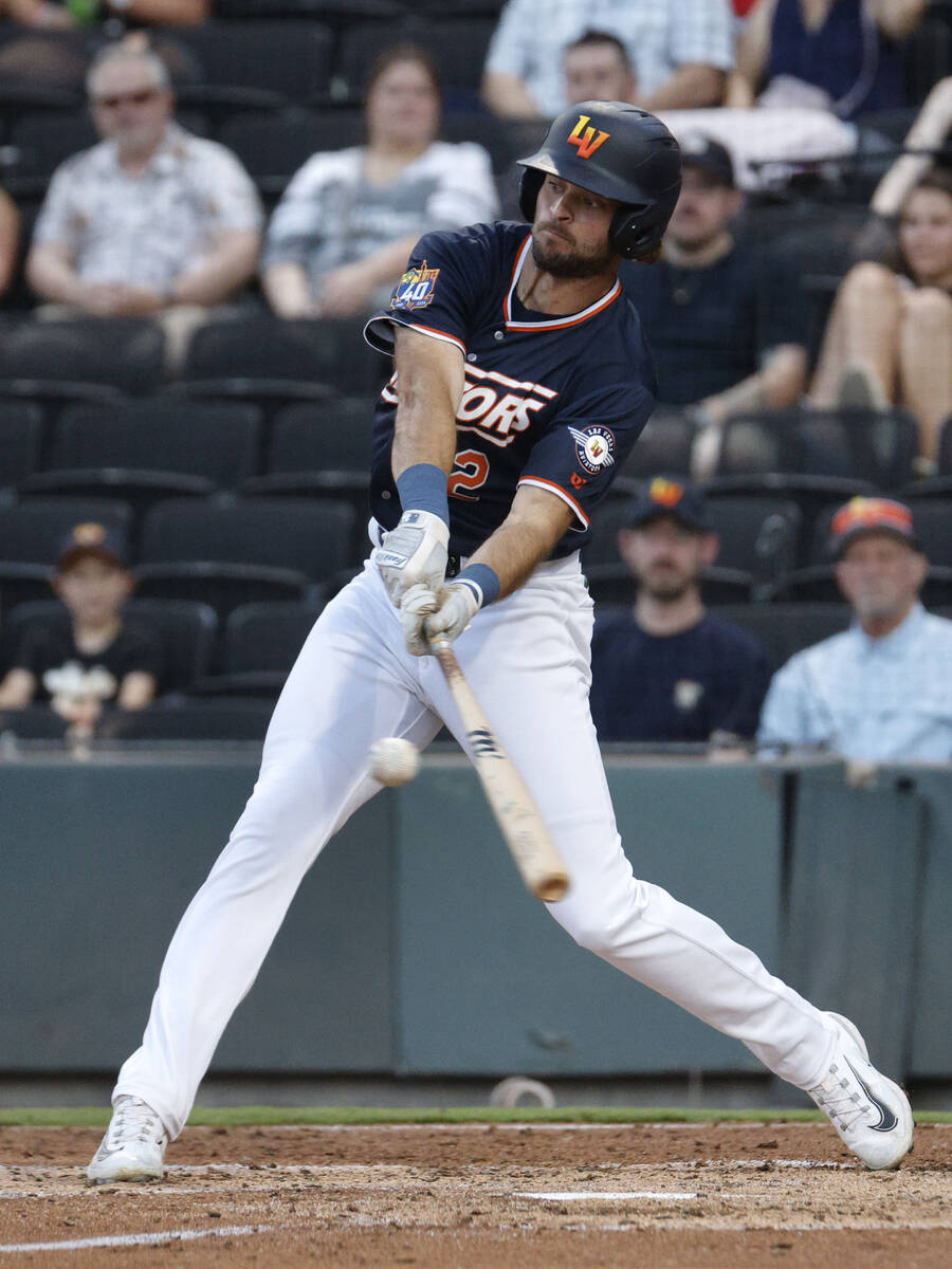 Aviators outfielder Cody Thomas (12) connects with the ball during the second inning of a baseb ...