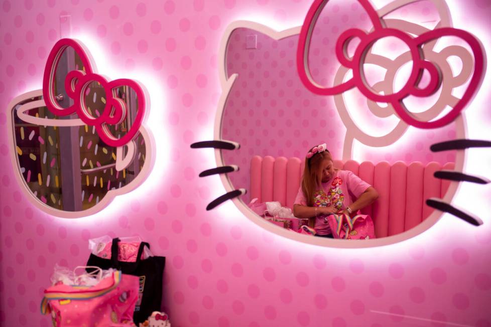 Kookie Lai sits in one of the seating areas at the Hello Kitty Cafe inside Fashion Show mall. ( ...