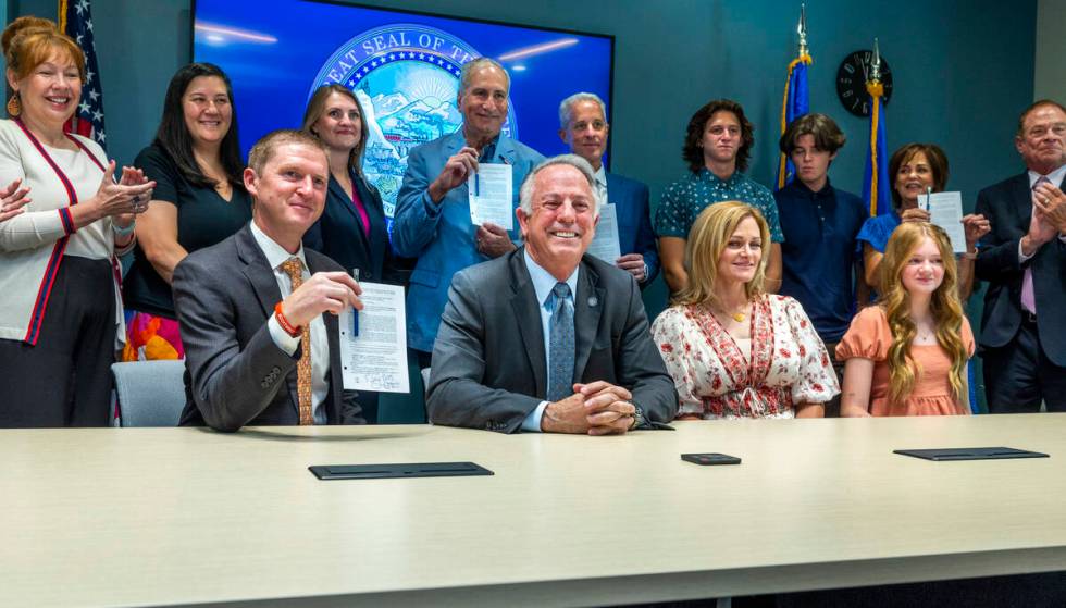 Nevada Gov. Joe Lombardo conducts a ceremonial signing of SB 322 aka Rex's Law about members of ...