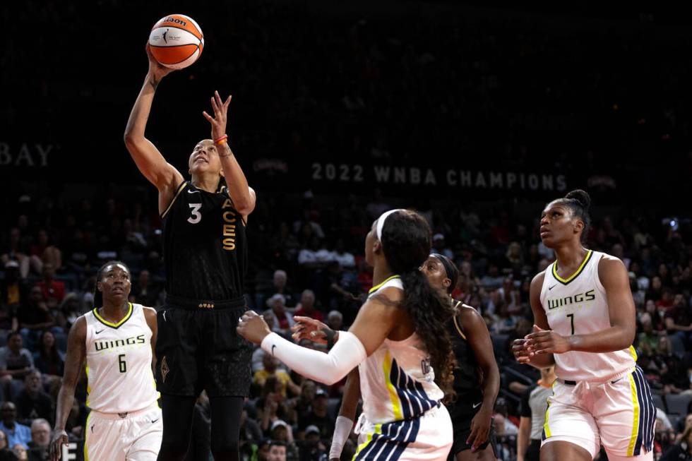 Las Vegas Aces forward Candace Parker (3) shoots against Dallas Wings guard Arike Ogunbowale, c ...