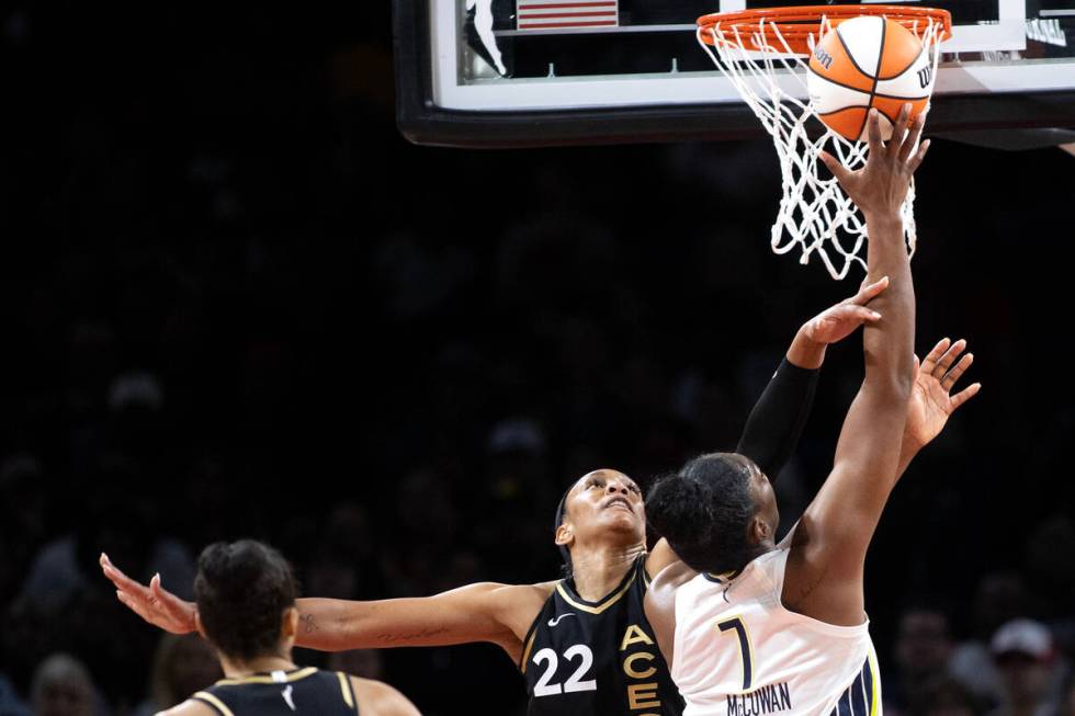 Las Vegas Aces forward A'ja Wilson (22) attempts to block a shot by Dallas Wings center Teaira ...