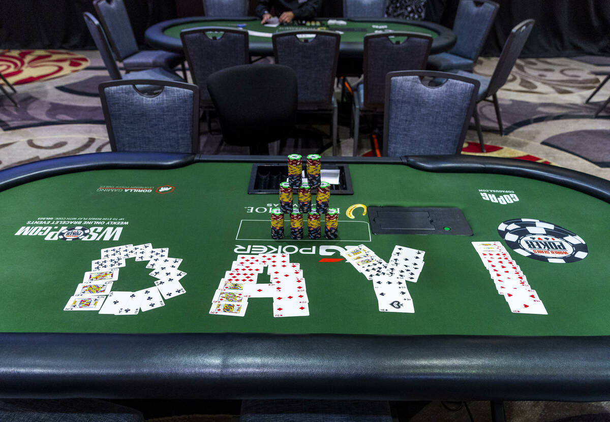 A table is ready for play during the final starting flight of World Series of Poker $10,000 buy ...