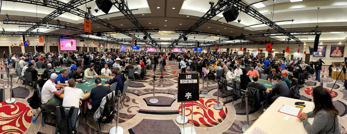 Play continues in one of many rooms during the final starting flight of World Series of Poker $ ...
