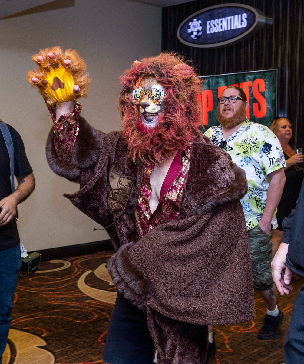 Daniel "Jungleman" Cates arrives to make a grand entrance with Phil Hellmuth during t ...
