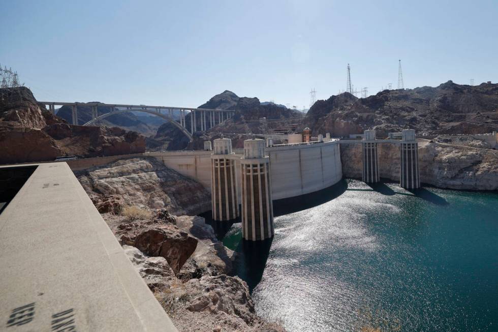 The Hoover Dam is seen from the Arizona side, Thursday, July 6, 2023, near Boulder City, Nev. ( ...